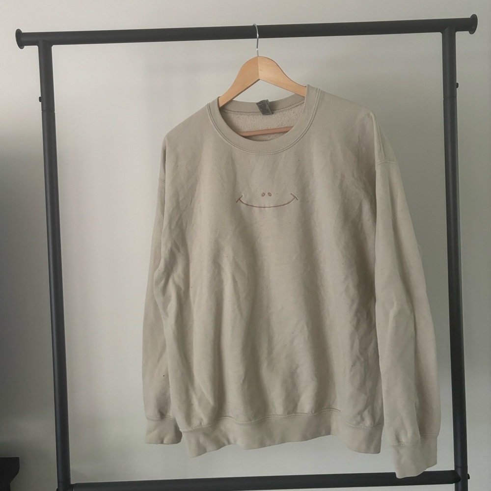 Etsy, smile embroidered tan sweatshirt, size medium.